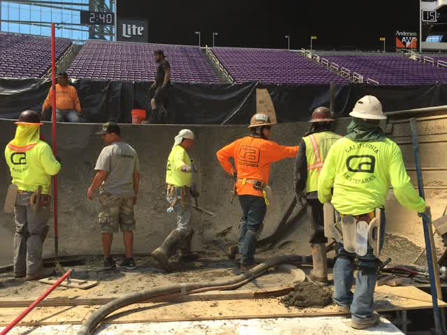 Event crews coordinate on-site preparations.